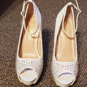 White sequine peep toe pumps